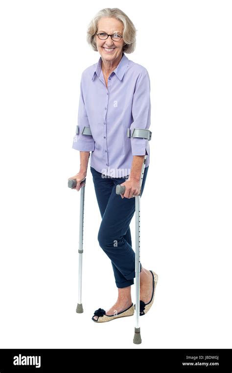 Full Length Senior Woman Crutches Hi Res Stock Photography And Images