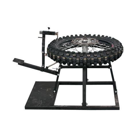 Use your tire irons to lever one side of the tire up over the rim. Tire changing stand and Tire changing tips - Tech Help ...