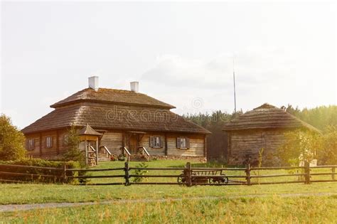 Wooden Ethnic Houses On Rural Landscape Village Of Birthplace Of