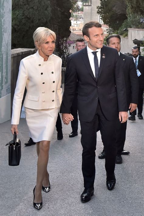 Brigitte macron, french president emmanuel macron, us president donald trump and first lady melania trump pose atop the eiffel tower in paris on july 13, 2107. Emmanuel Macron Is The Romantic Trooper The World Was In ...