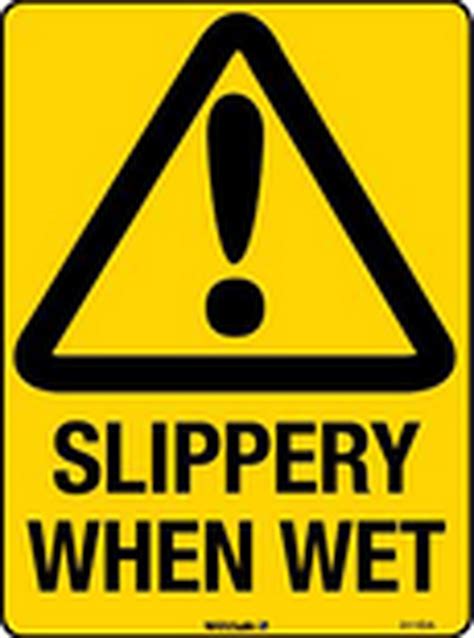 slippery when wet caution signage signage wa safety workwear work boots industrial