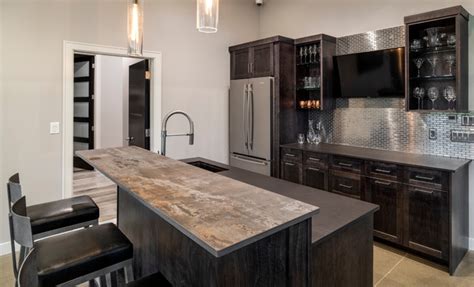 Check out these arctic white quartz countertops compliment by a muted, teal wall and a burst of white cabinets. Gorgeous Modern Home w/ Dark Wood and Cambria Quartz Countertops - Modern - Home Bar - Other ...