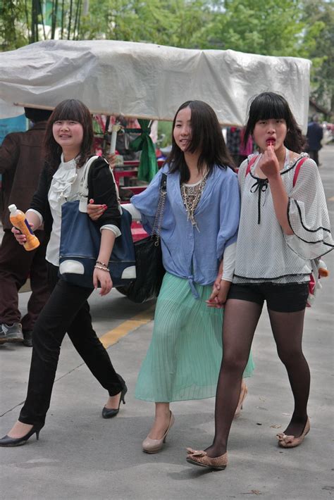 Young Chinese Girls At A Street Market Outside Of Rural Ma Flickr