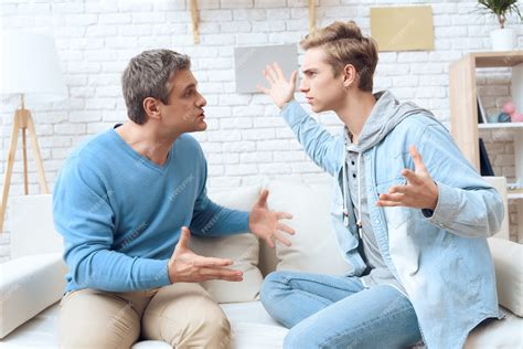 Premium Photo Father And Son Are Arguing With Each Other
