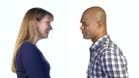 Man And Woman Nod Their Heads Showing Agreement With Each Other