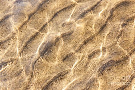 Water And Sand Ripples Photograph By Elena Elisseeva