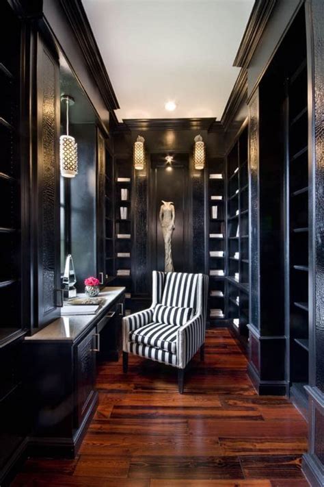 Stunning Dark Walk In Closet With Black And White Armchair Dressing