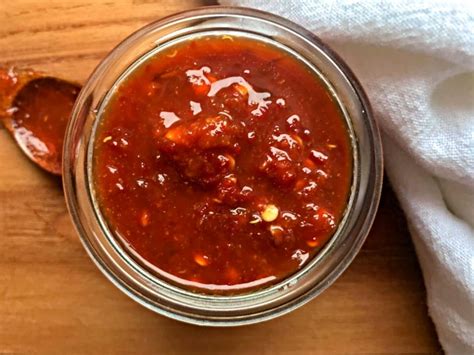 Chili garlic sauce, a little bottle of fiery, tangy goodness. Homemade Chili Garlic Sauce Recipe » Housewife How-Tos®