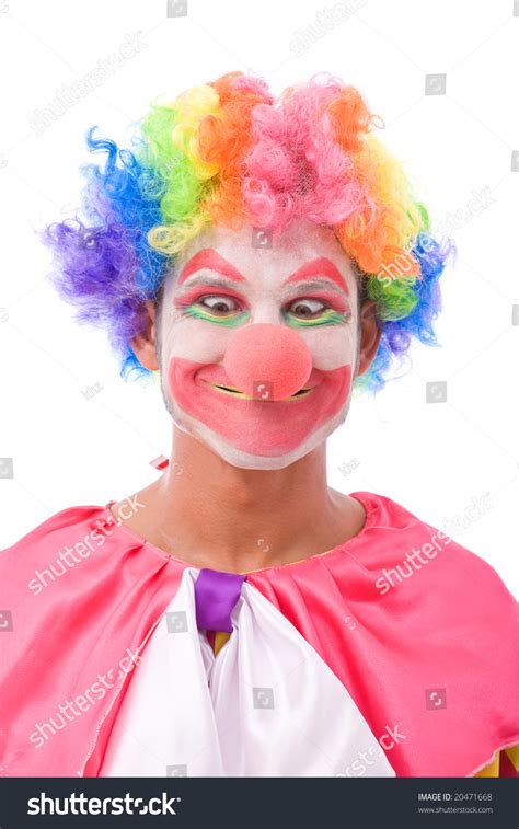 Funny And Colorful Clown Making A Face On White Background Stock Photo