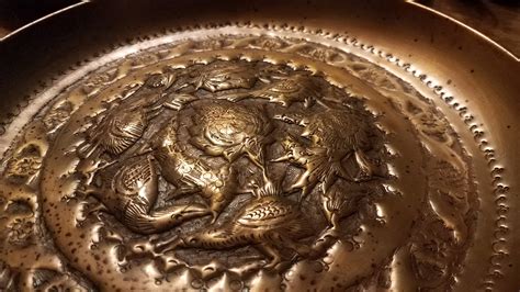 Copper repoussé and chased copper decorative plates where from Antiques Board