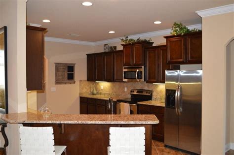 Selecting a floor cabinet is a simple task that has a huge impact on both the appearance and functionality of your bathroom (can you say win!). The Kitchen of this Cynthia floor plan model home is a great feature along the Gulf Coast ...