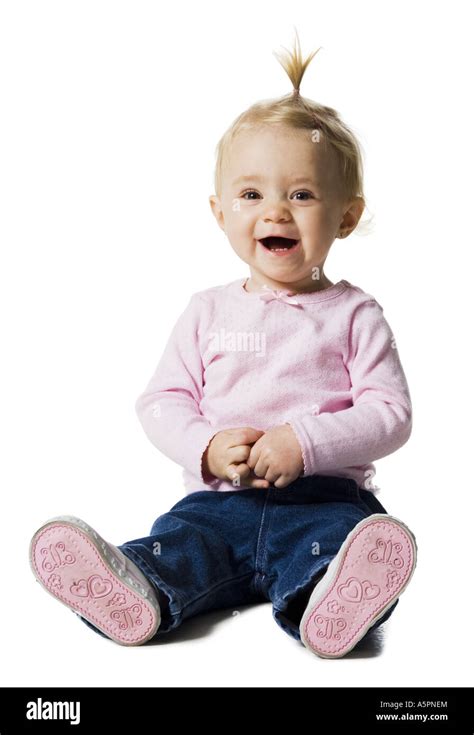 Baby Girl Ponytail Sitting Smiling Cut Out Stock Images And Pictures Alamy
