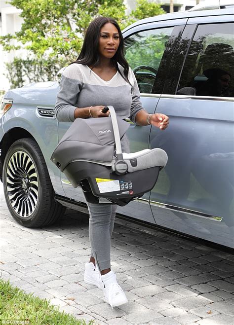 Serena Williams Carries Her Daughter Alexis In A Car Seat Daily Mail