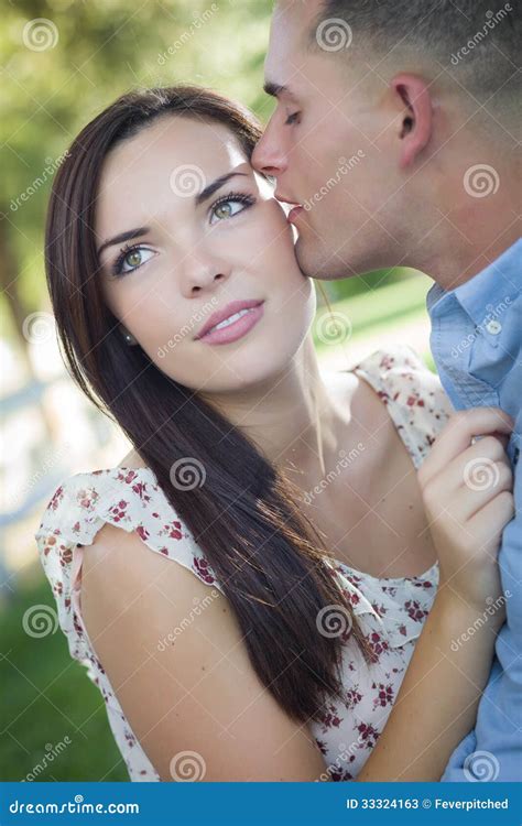 Kissing Mixed Race Couple Portrait In The Park Stock Image Image Of