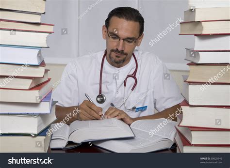 A Doctor Studying In His Office Stock Photo 59625946 Shutterstock