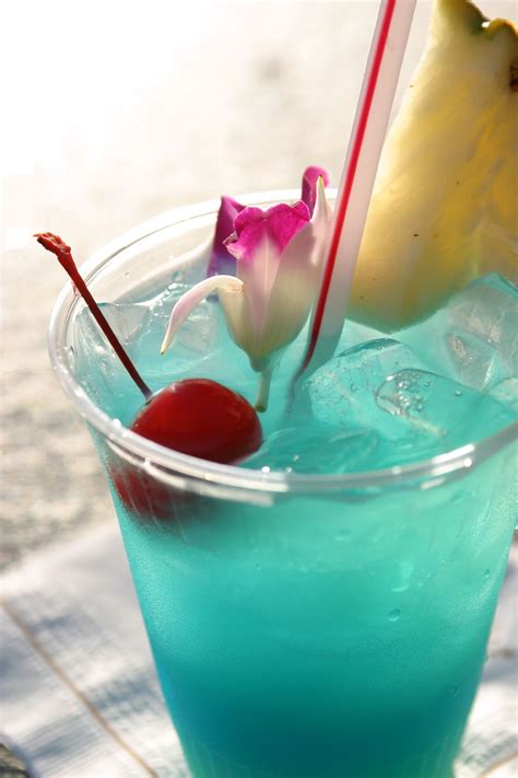 If you are worried about overworking your blender, work in batches. Tropical Cocktail Drinks: The Blue Hawaiian Recipe | Malibu coconut, Drinks, Tropical drink