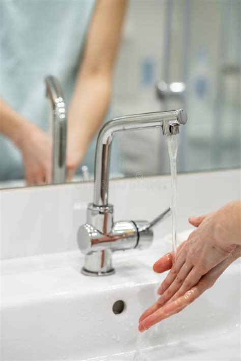 a woman washes her hands with soap stock image image of disinfect carefully 179041805