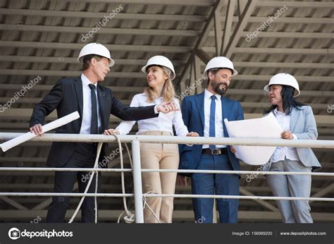 Architects Talking At Construction Site — Stock Photo © Natashafedorova