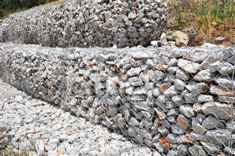 Close Up On A Gabion Stone Erosion Wall System Stock Photo Royalty