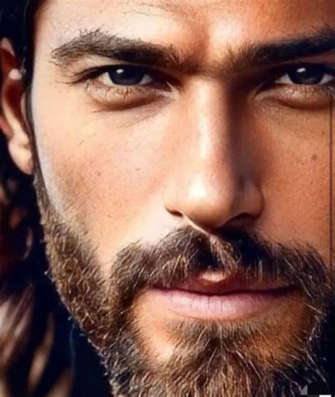 A Close Up Of A Man With Long Hair And Beard