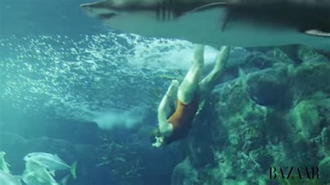 Rihanna Swims With Real Sharks For Daring Photo Shoot