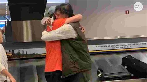 Man Surprises Brother At Airport After 20 Years
