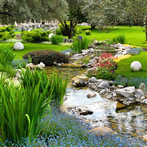 Natural Sprawling Garden With Stream Water Feature Landscaping On A
