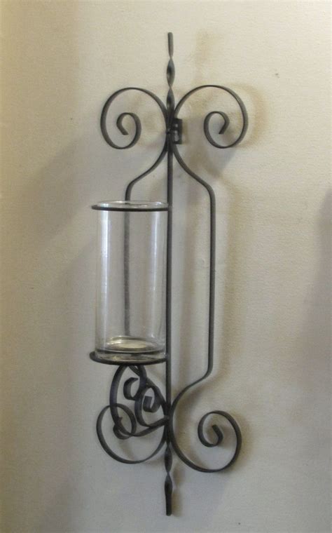 Add a touch of dapper distinction to your walls with this traditional candle wall sconce. Wrought Iron Wall Sconce Candle Holder / Vase XL OOS ...