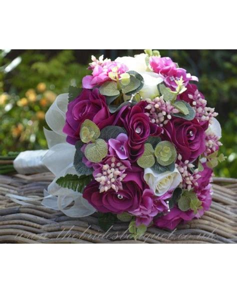 Unique And Stunning Magenta Rose Brides Bouquet Which Is Ready To Be