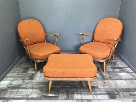 Armchair have been renovated and reupholstered with a new fabric, with the. Stunning Pair Of Retro Ercol Armchairs And Footstool ...