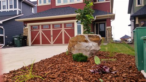 A Well Placed Accent Boulder Makes A Unique Feature In An Average Sized