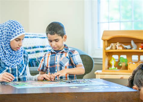 Any specific product you recommend? Middle Eastern Children Doing A Puzzle At Home Stock Photo ...