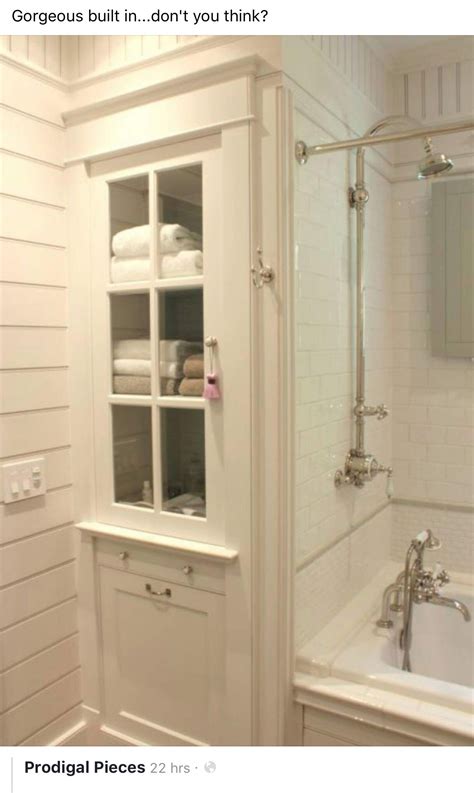 Chic master bathroom boasts a space between a walk in shower and a water closet filled with white built in linen cabinets accented with mirrored doors. Pin by Ashley Higgins on Home (With images) | Small ...