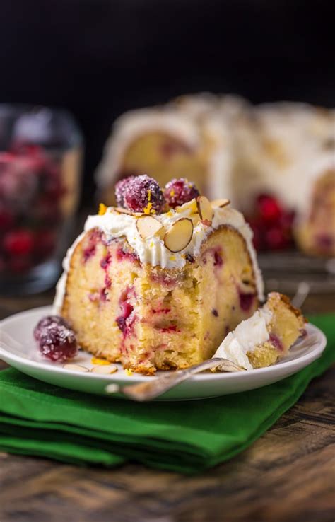 Sprinkle some icing sugar for some festive magic! White Chocolate Cranberry Bundt Cake - Baker by Nature