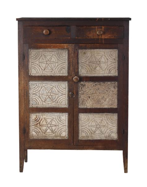 What kind of cabinet has a pie safe? Kovel's Antiques: Pie safes now used to store clothes ...