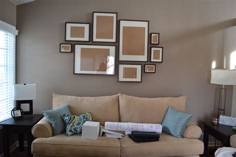 Another idea for hanging ikea ribba frames | Gallery wall living room, Frame wall layout, Family ...