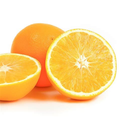 Premium Photo Orange Whole And Two Halves On A White