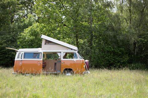 Classic Camper Van Parked In A Field Ready For Camping Editorial