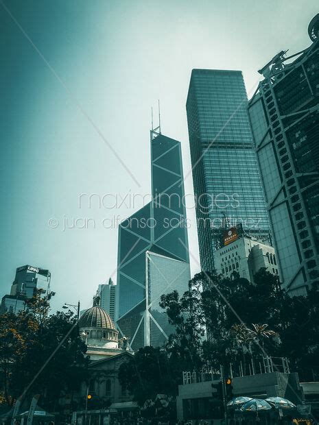 Photo Of Bank Of China Tower And Modern Buildings On Streets Of Hong