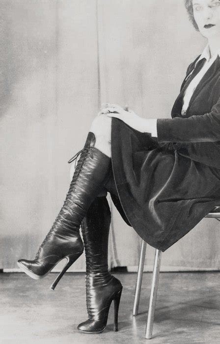 Vintage Dominatrix In Boots Bobs And Vagene