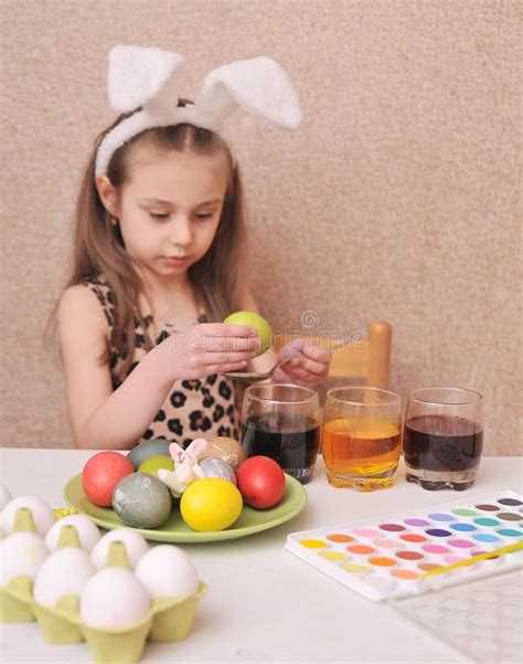 Little Girl Painting Easter Eggs At Home Stock Image Image Of