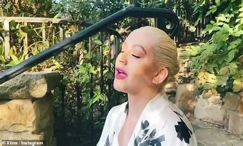 Christina Aguilera Wears Plunging Black Swimsuit And A Pink Lip During
