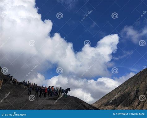 Blue Sky White Thick Cloud Mountain Horses And Climbers Editorial