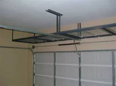 Strong Metal Suspended Shelving In Simple Design Added Above Car Garage