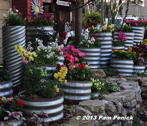 Drive By Gardens Colorful Culvert Pipe Planters In Houston Heights