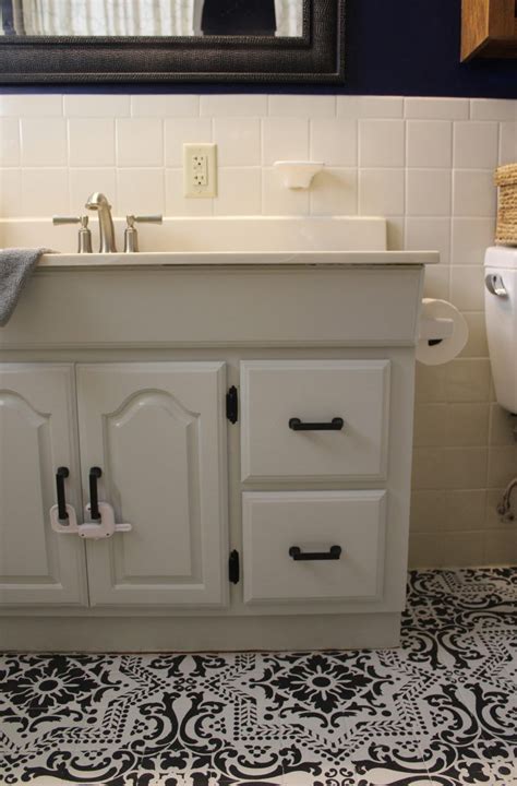 Updating your vanity can add tons of style and personality to your bathroom. A painted bathroom vanity makeover: before and after ...