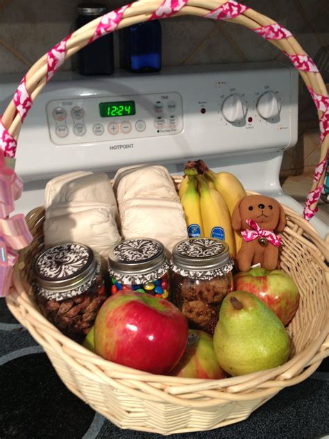 Buying gifts for your parents can be tough. Gift basket for the new mom and dad! Fruit, nuts ...