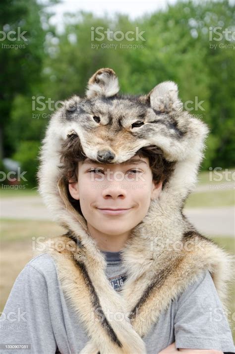 Boy Wearing Wolf Pelt Over His Head Stock Photo Download Image Now