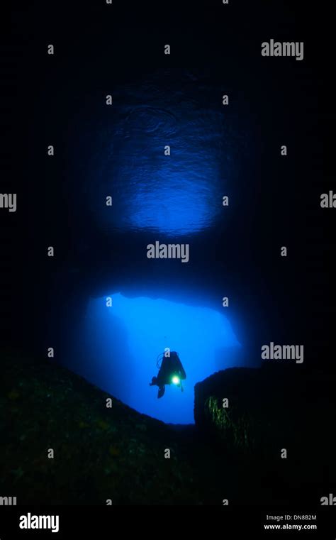 Scuba Diver In A Cave Stock Photo Alamy