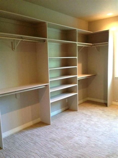 This closet is about the size of ours, too, so i find the way she organized it really inspiring as well. Built In Closet Systems Modest Plain | Closet planning ...